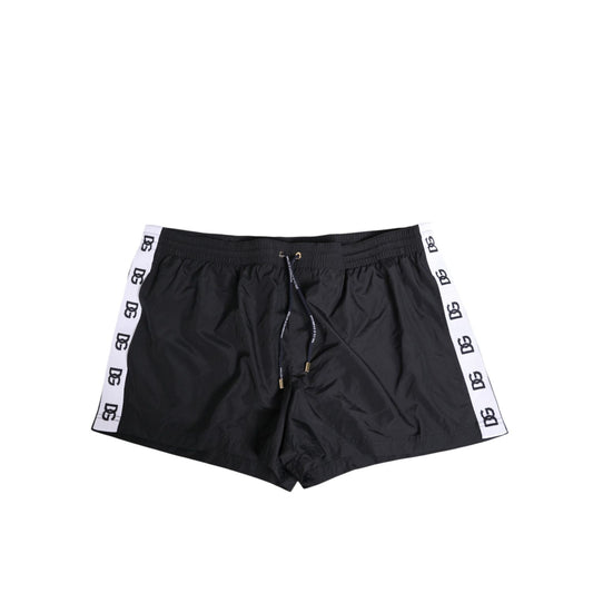 Dolce & Gabbana Black Nylon Side Logo Tape Shorts Swimwear with elastic waistband and drawstring, front and back zipper pockets.