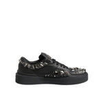 Dolce & Gabbana Black Portofino Studded Men Sneakers Shoes with black leather and silver studded detailing, side view.