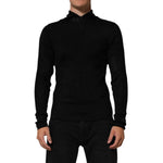 Man wearing Dolce & Gabbana Black Viscose Turtle Neck Pullover Sweater with zipper closure, showcasing sleek design and logo details.