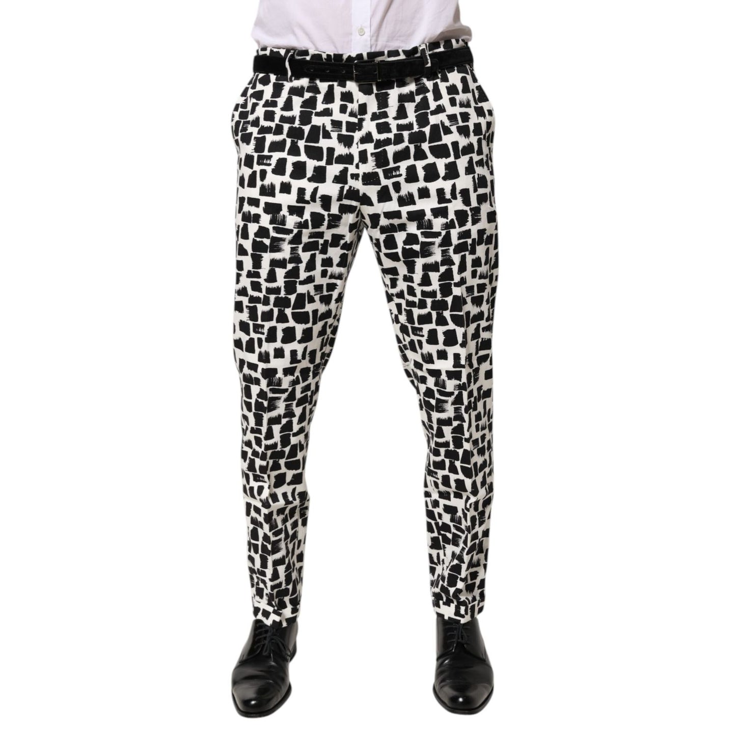Dolce & Gabbana Black White Abstract Print Cotton Blend Pants with brushstroke pattern, tailored fit, zipper closure, and logo details.