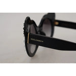 Side view of Dolce & Gabbana DG4325BM White Black Acetate Crystal Shades Sunglasses with gray lenses and minor defect visible.