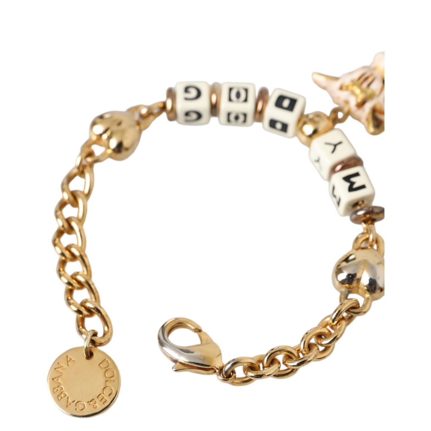 Dolce & Gabbana Gold Tone Brass Chain MY DOG Heart Bracelet with enamel dog face charm, gold chain, and lobster closure for women.