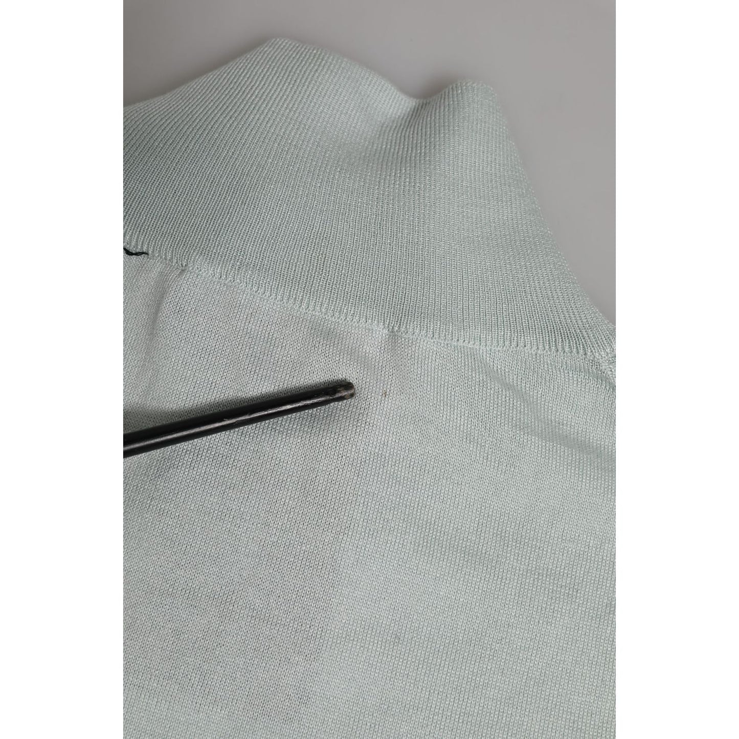 Close-up of Dolce & Gabbana Gray Turtle Neck 3/4 Sleeves Pullover Top in soft fabric with neckline detail.