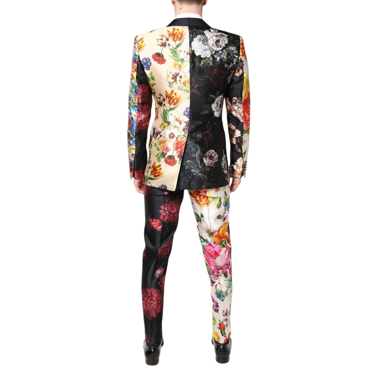Back view of Dolce & Gabbana Multicolor Floral SICILIA Silk 3 Piece Suit, showcasing vivid floral patterns on a slim fit design.