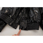 Close-up of Dolce & Gabbana Polyester Black Shiny Blazer Women Jacket with replaced button detail.