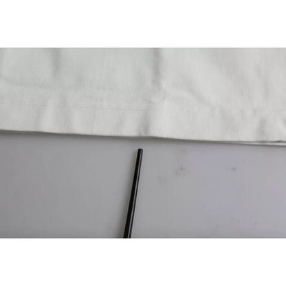 Image showing a section of the Dolce & Gabbana White Love & Peace Cotton Round Neck T-shirt with minor defect marks on the fabric.