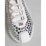 Close-up of Dolce & Gabbana White NS1 Canvas Leather Embellished Sneakers Shoes with rhinestones and logo details.