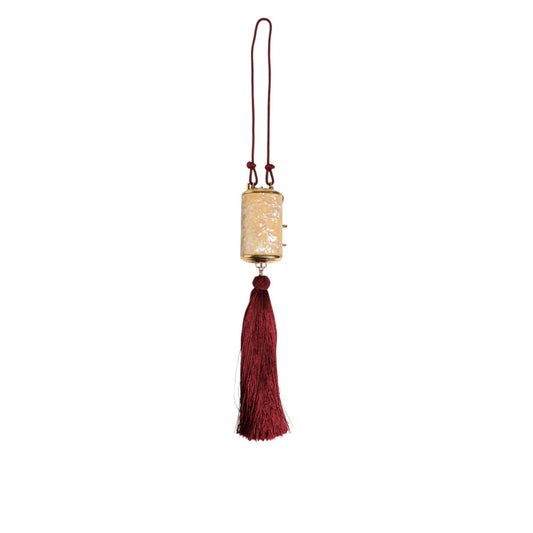 Dolce & Gabbana White Resin Gold Metal Crossbody Mini Purse Tassel Bag with elegant gold details and burgundy tassel.