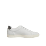 Dolce & Gabbana White Silver Sacred Heart Men Sneakers Shoes with white leather and metallic accents on a rubber sole.