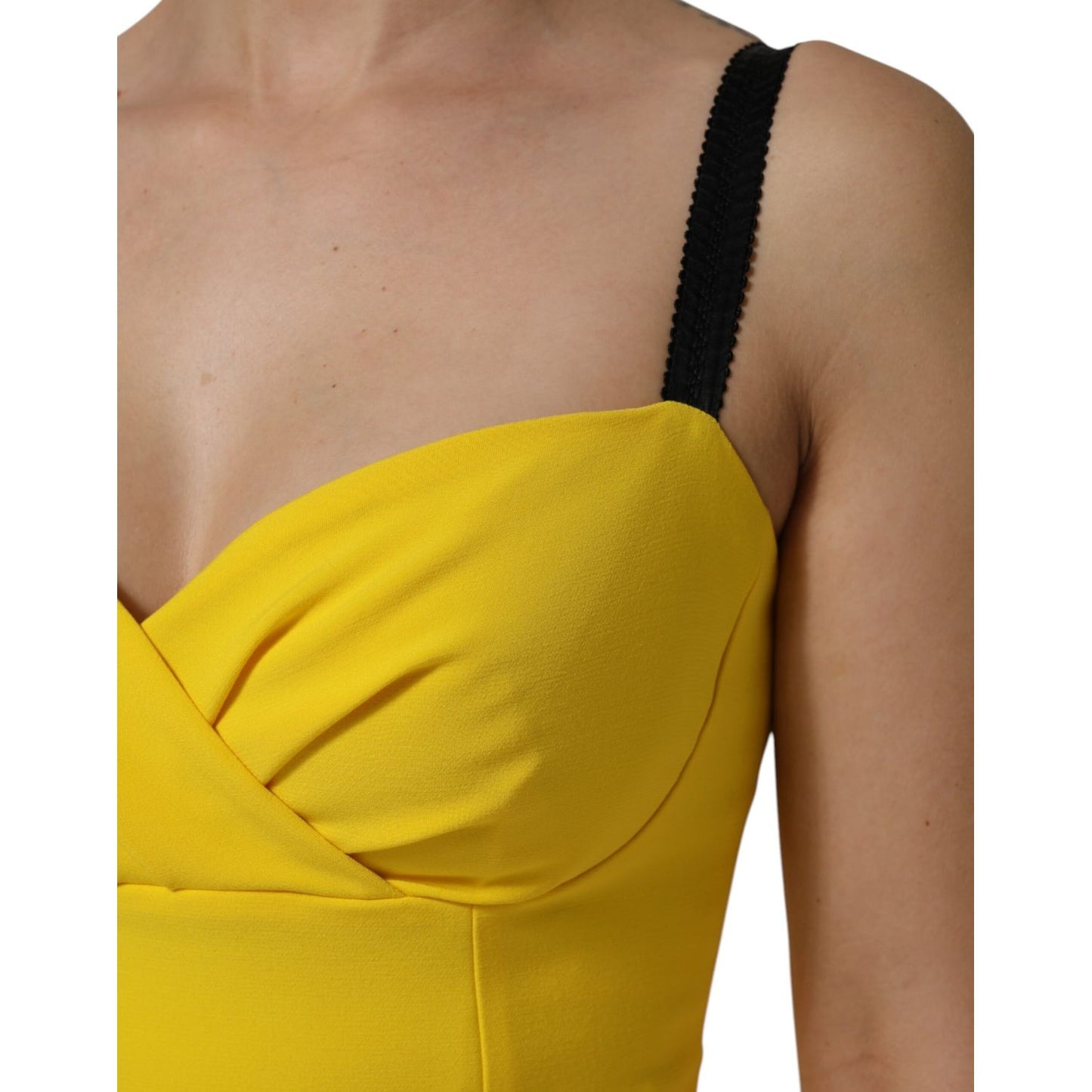 Close-up of Dolce & Gabbana Yellow Polyester Sleeveless Sheath Midi Dress with black strap detail.