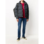 Man wearing Emporio Armani Coats Blue, dark blue padded jacket, front zip and press-stud fastening, with two side slit pockets.