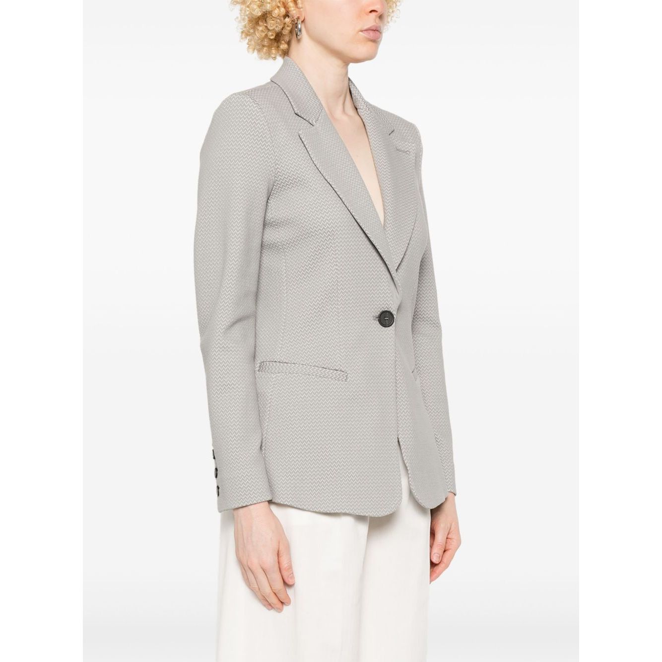Light grey Emporio Armani Icon Blazer with button fastening and shoulder pads, model wearing size 40 IT, showcasing elegant design.