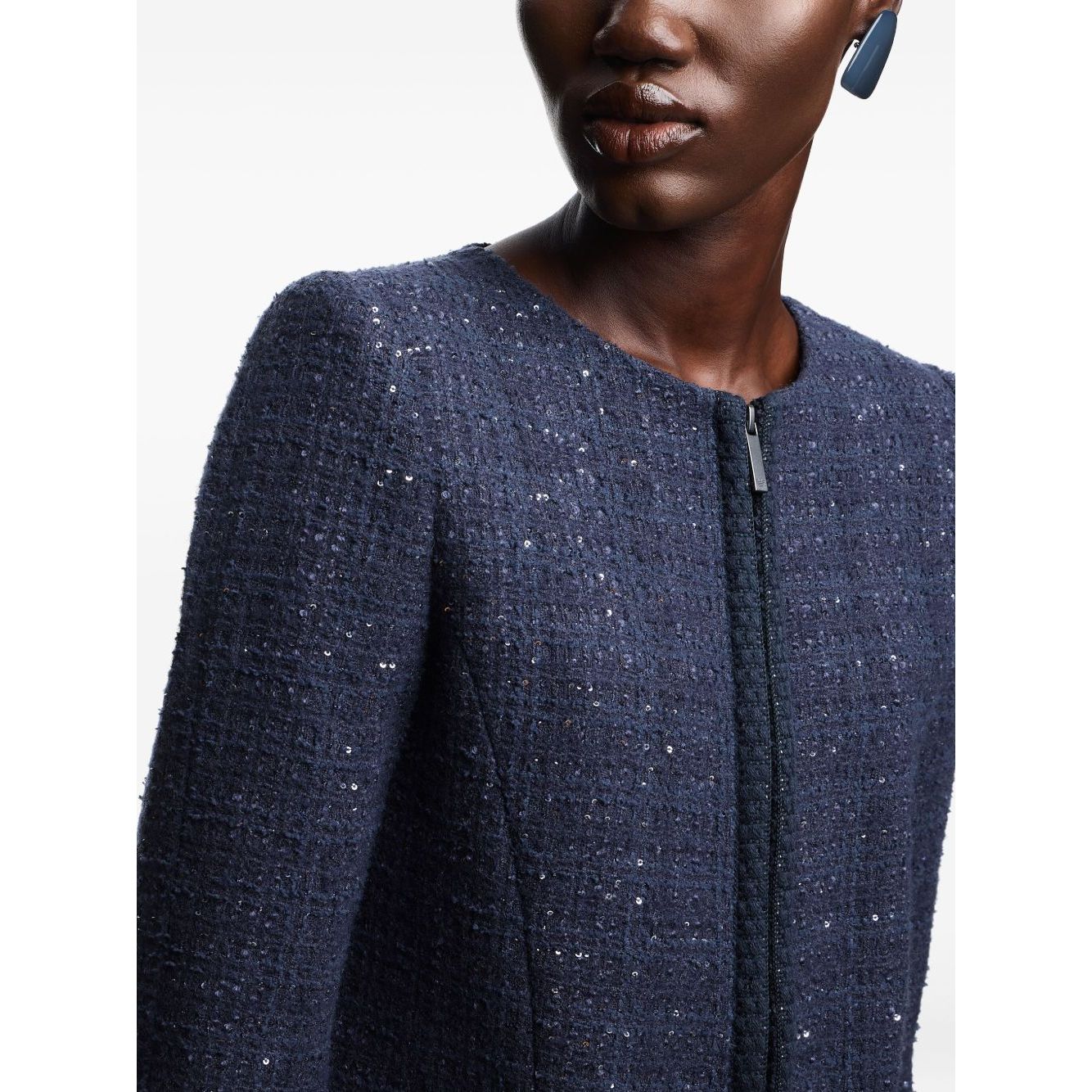 Woman wearing Emporio Armani Jackets Blue with navy blue tweed texture and sequin embellishments, showcasing front zip fastening and long sleeves.