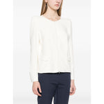 Model wearing white Emporio Armani Ottoman-jersey jacket with zip fastening and shoulder pads, styled with dark trousers.