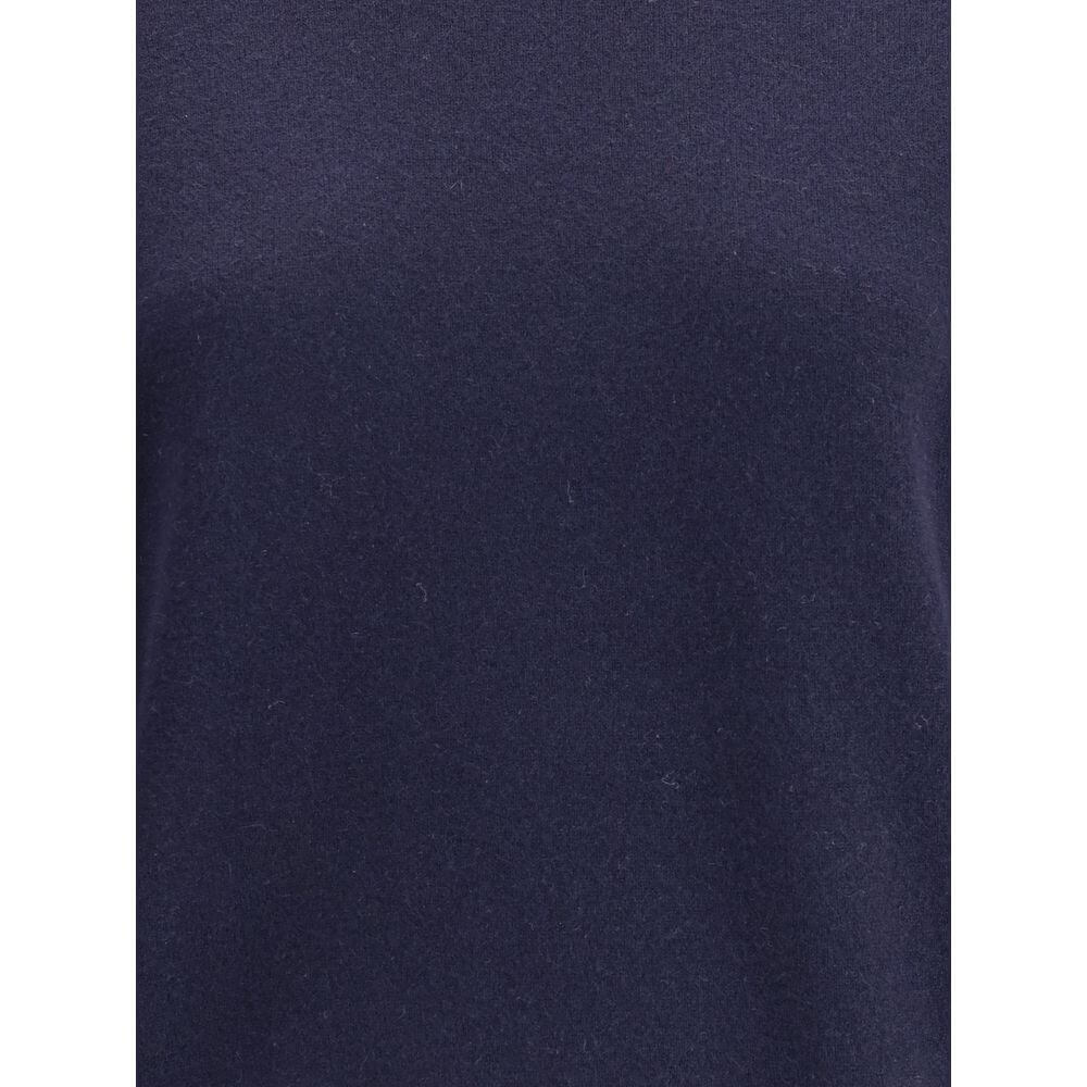 Extreme Cashmere Blue Cashmere Cashmere Sweater with crew neck design and ribbed details, shown in a close-up view.