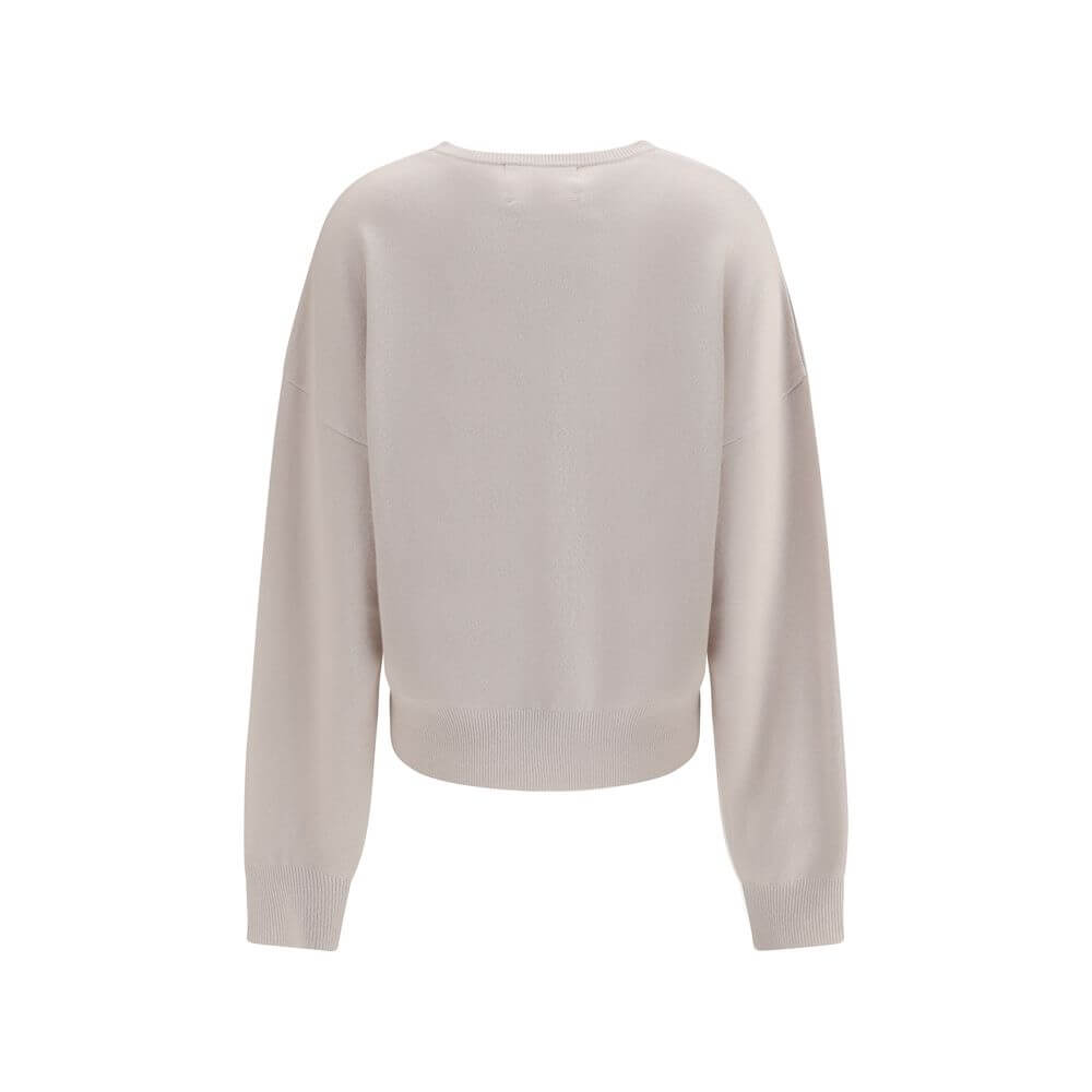 Extreme Cashmere Cream Cashmere Sweatshirt with ribbed cuffs and hem, featuring a modern and comfortable design with crew neck and dropped shoulders.