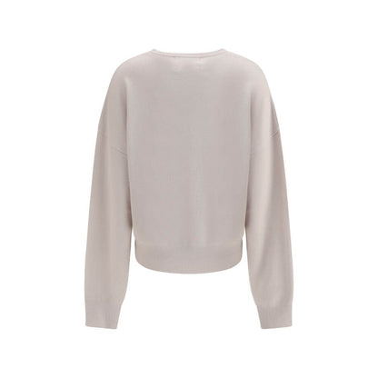 Extreme Cashmere Cream Cashmere Sweatshirt with ribbed cuffs and hem, featuring a modern and comfortable design with crew neck and dropped shoulders.