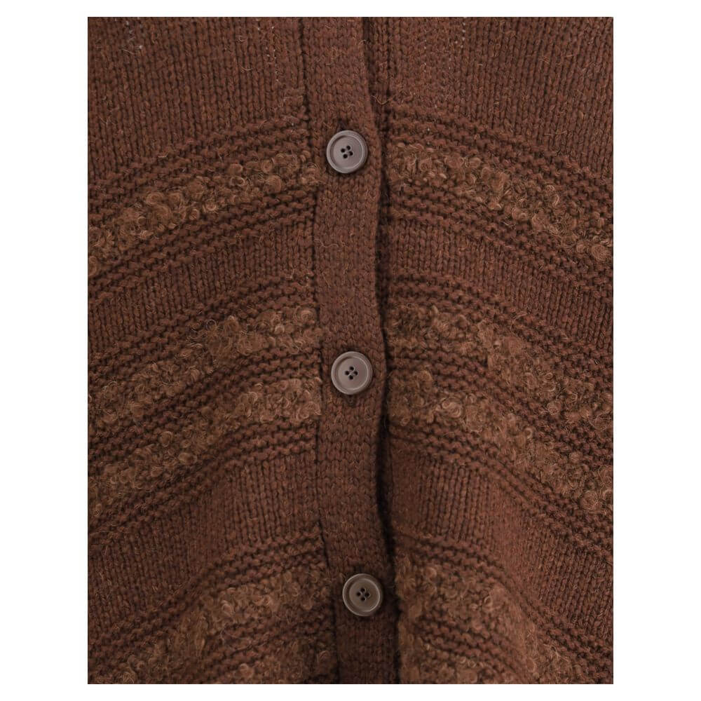 Close-up of Fabiana Filippi Brown Camel Hair Cardigan with button closure and ribbed hem, featuring intricate textured knit design for AW25.