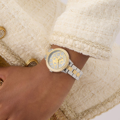 GUESS Mod. G Lace watch on wrist wearing a beige textured jacket.