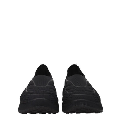 Front view of Givenchy Black Fabric Slip-On Loafers with side logo, round toe, mid heels, and 6 cm heel height.