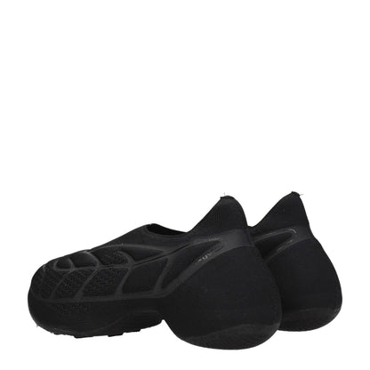 Rear view of Givenchy Black Fabric Slip-On Loafers with side logo and mid heels.