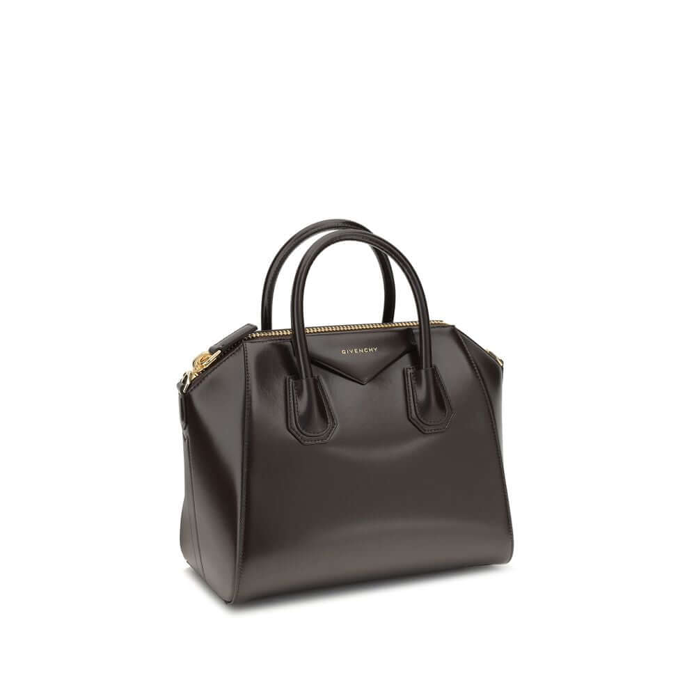 Givenchy Brown Calf Leather Bos Taurus Handbag with glossy finish and detachable strap. Antigona design with zipper and pockets.