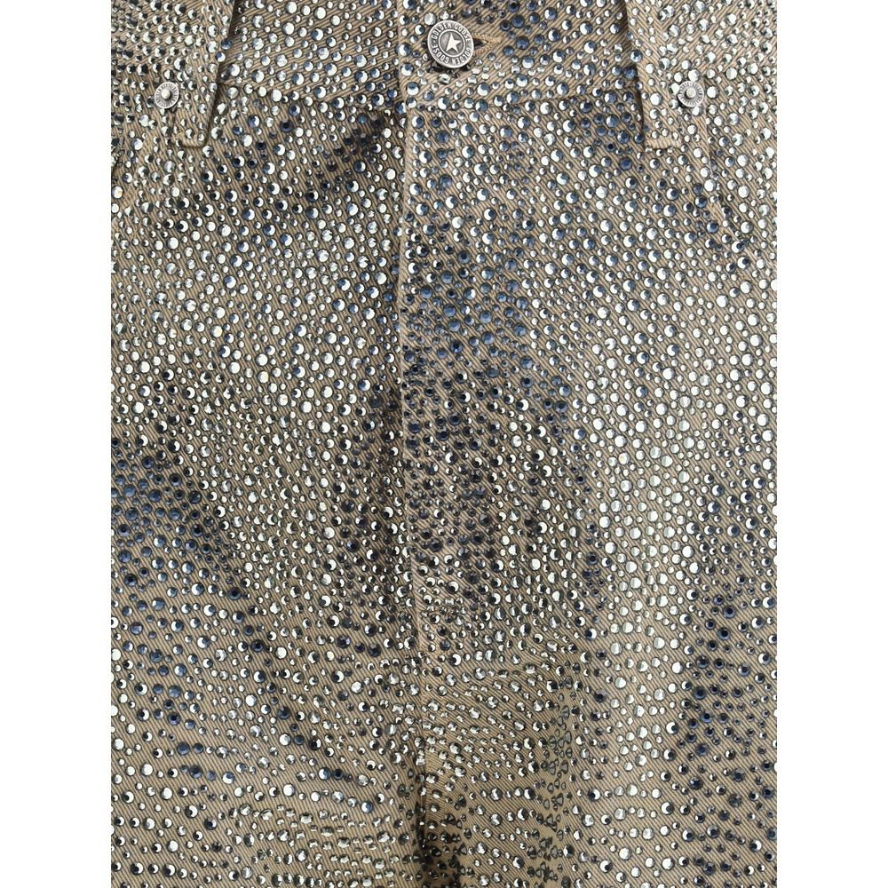 Close-up of Golden Goose Bicolor Cotton Straight-Leg Jeans with rhinestone detailing, showcasing button closure and pocket style.