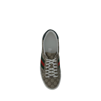 Top view of Gucci Beige Rubber Low Top Sneakers with GG jacquard fabric and iconic monogram on tongue.