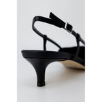 Guess Black Polyester High Heel with adjustable buckle strap and low heel, featuring sleek black design and metallic logo detail.