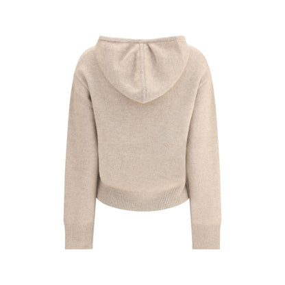 Back view of Guest in Residence Beige Cashmere Hoodie with ribbed hem and cuffs, showcasing the soft texture and adjustable hood.