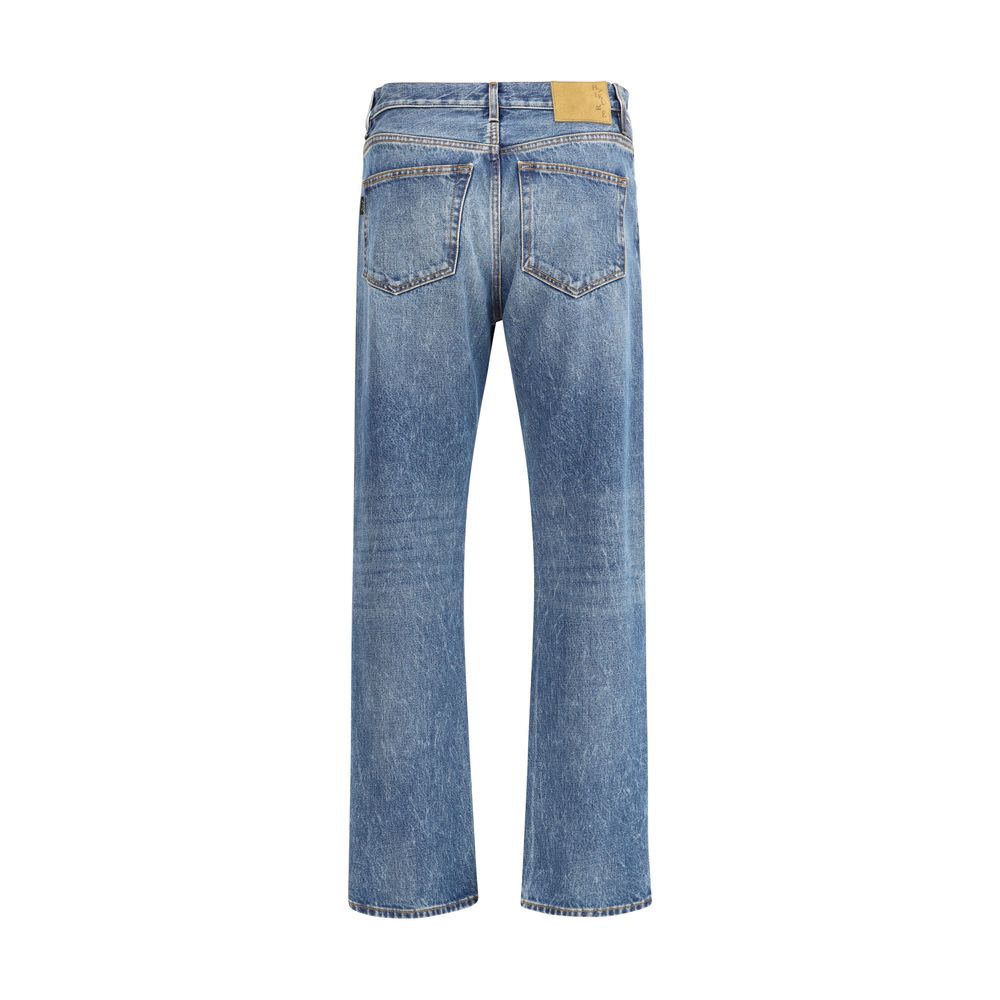 Back view of Haikure Blue Cotton Straight-Leg Jeans with leather patch and vintage effect pattern.