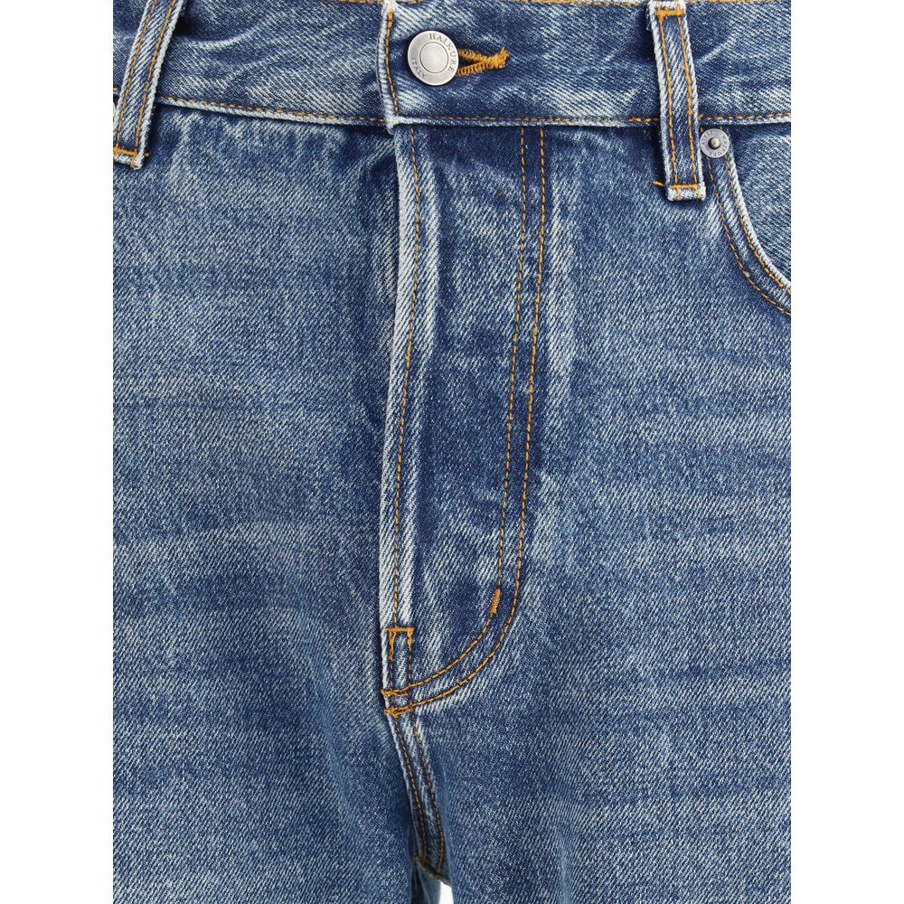 Close-up of Haikure Blue Cotton Straight-Leg Jeans with button closure and belt loops, showing vintage monochrome denim texture.