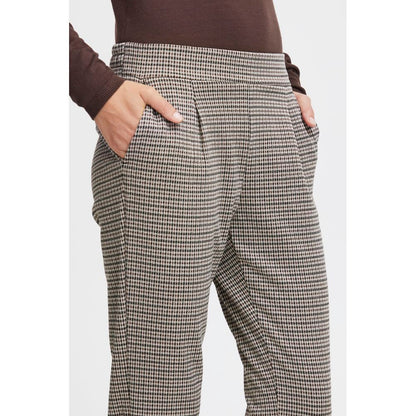 ICHI Beige Polyester Casual Pants for women with stylish flat waistband and side pockets, showcasing refined and versatile fashion.