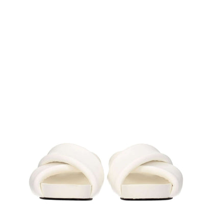 Jil Sander White Leather Slippers with vintage effect, open toe, and mid heels. Casual style, optic white leather, 4 cm heel height.
