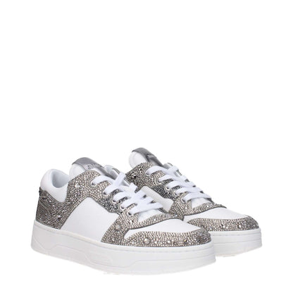 Alt Tag: Jimmy Choo White Leather Chunky Sneakers with rhinestone accents and logos, featuring a lace-up closure and silver highlights.