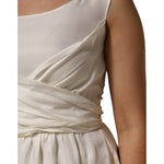 Close-up of L'Autre Chose Ivory White Sleeveless Maxi Cupro Viscose Dress with draped waist detail.