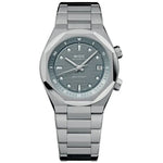 MIDO MOD. M047-507-11-081-00 stainless steel watch showcasing a sleek, elegant design with a textured grey dial and date display.