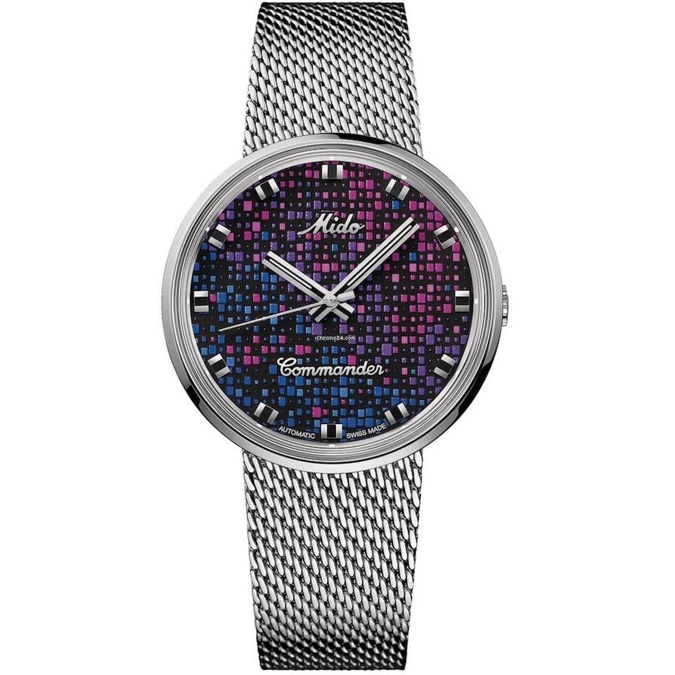 MIDO MOD. M8429-4-N7-11 watch with vibrant pixel-patterned dial and mesh strap.
