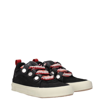 Marcelo Burlon Black Leather Low Top Sneakers with rubber sole, vintage effect, and red accents.