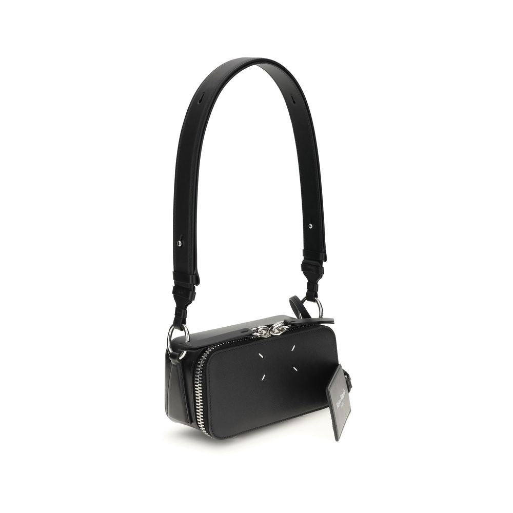Margiela Black Calf Leather Bos Taurus Shoulder Bag with adjustable strap and zippered closure, featuring four-stitch logo.