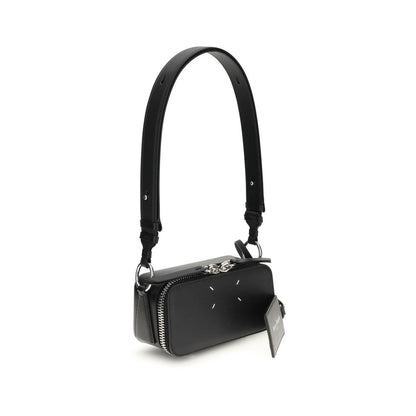 Margiela Black Calf Leather Bos Taurus Shoulder Bag with adjustable strap and zippered closure, featuring four-stitch logo.