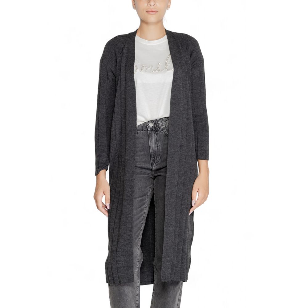 Model wearing Only Gray Marabou Cardigan made of 100% acrylic, perfect for layering on cool autumn and winter evenings.