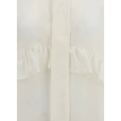 Close-up of P.A.R.O.S.H. Cream Silk Blouse showcasing delicate ruffles and elegant design for a refined feminine look.