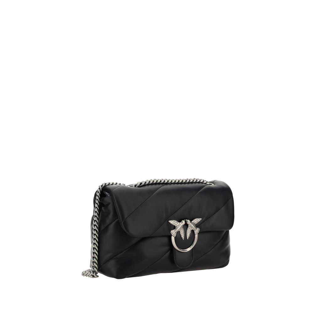 Front view with bag zipped and handles upright.