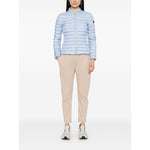 Model wearing Peuterey Coats Clear Blue, lightweight sky blue quilted jacket with two-way zip, pockets, and logo patch.