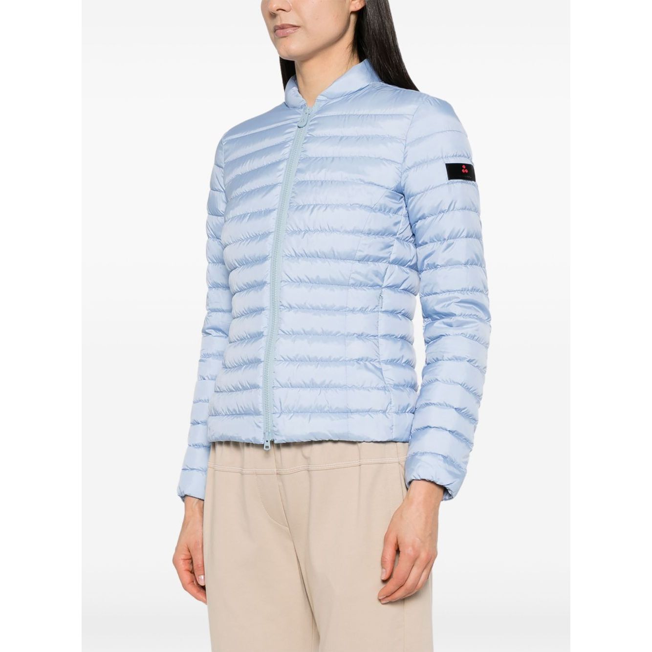 Peuterey Coats Clear Blue sky blue quilted jacket with front two-way zip and side pockets, logo patch on sleeve, lightweight design.