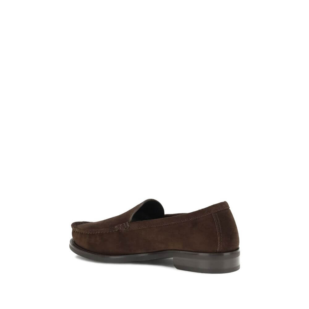 Side view of Prada Brown Calf Leather Bos Taurus Slip-On Loafers with suede finish and rubber sole.