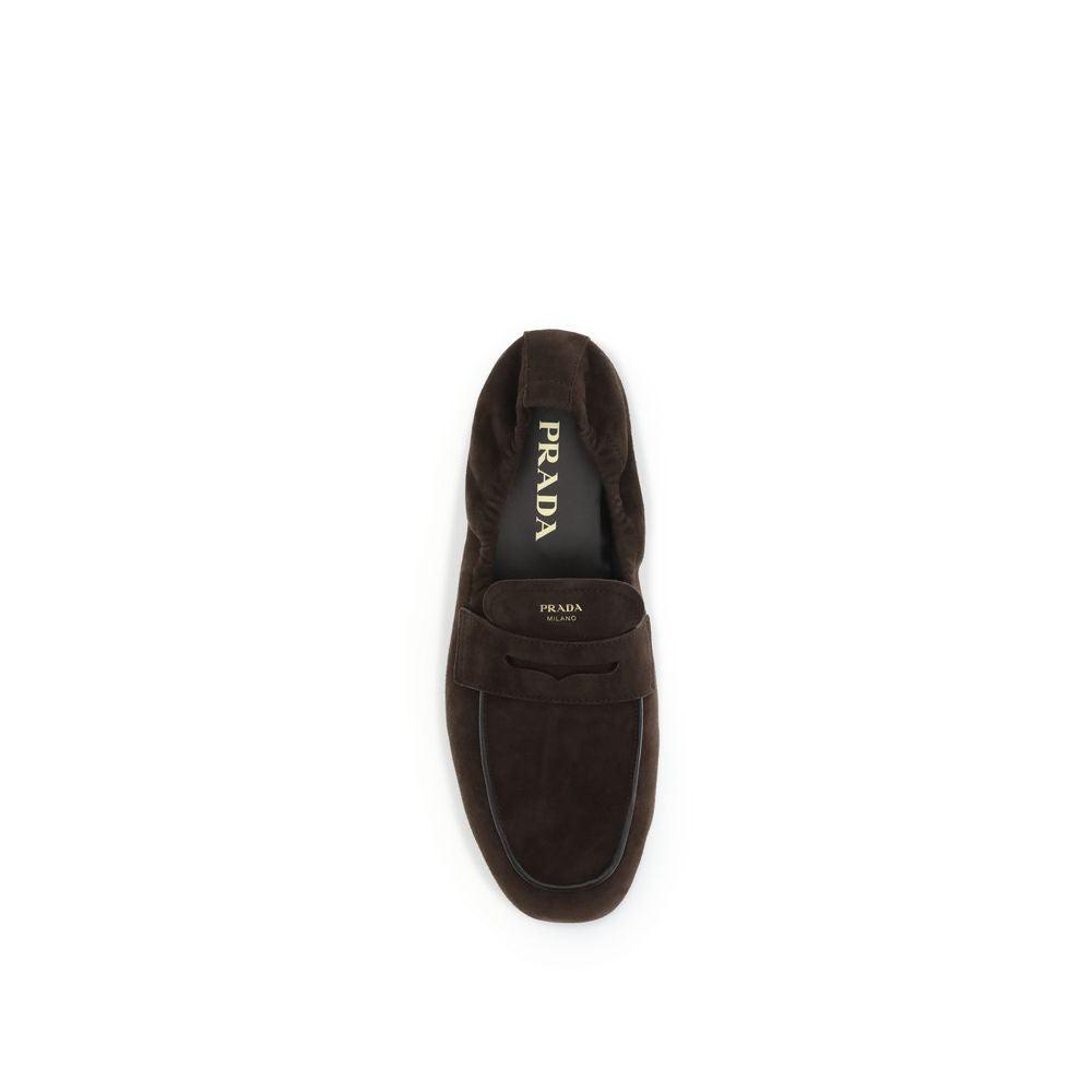 Top view of Prada Brown Lamb Ovis Aries Aries Slip-On Loafers with leather horsebit and logo details.