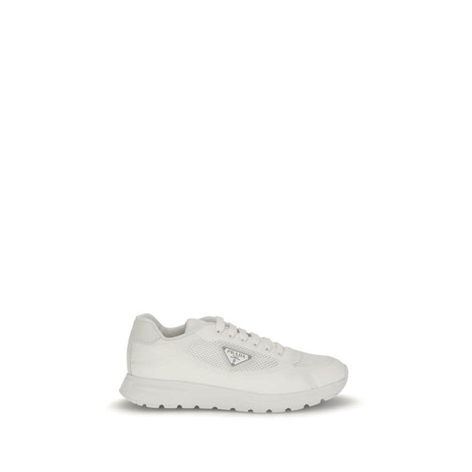 Prada White Rubber Athletic Sneakers with enameled triangle logo, technical fabric, and mesh design, showcasing modern urban style.