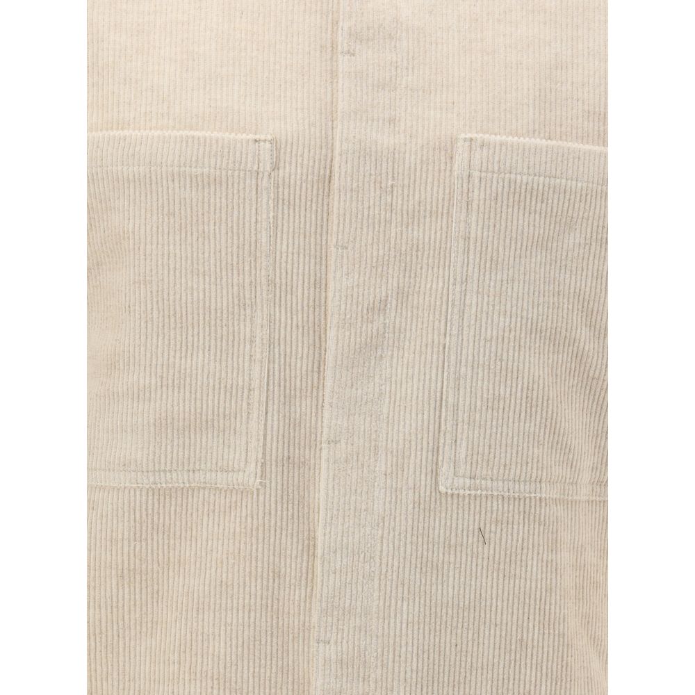 Close-up of Rick Owens Cream Cotton Shirt showing corduroy texture and two front patch pockets, part of the AW25 collection.